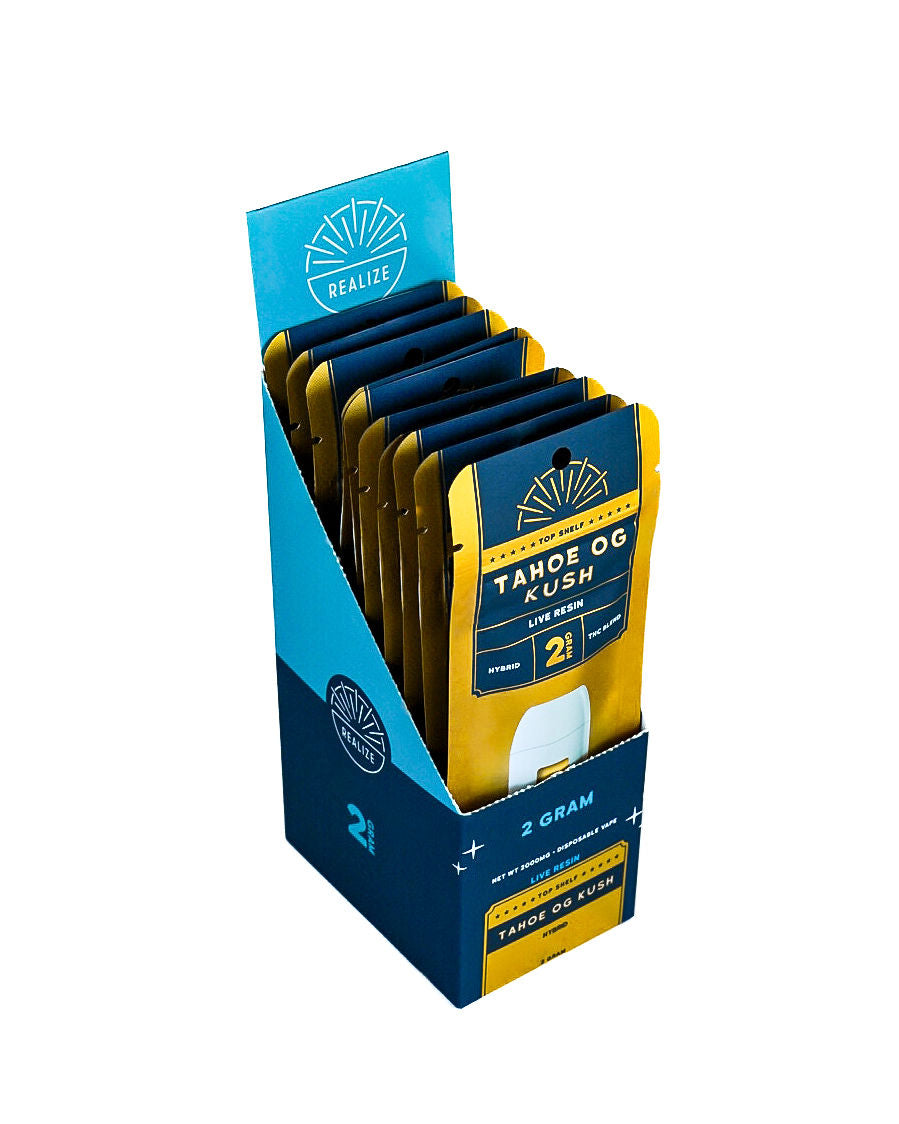 Realize Top Shelf Tahoe OG Kush 2 gram disposable vape retail display featuring gold and navy packaging with live resin THC blend branding.